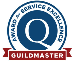 A GuildMaster logo is a capital Q in a blue circle surrounded by the words Award for Service Excellence. The words GuildMaster are set off in a burgundy banner at the bottom.
