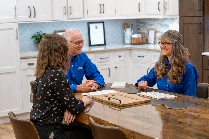 DreamMaker franchise owner consulting with a client in a Design Center